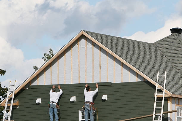 Professional Siding technician working in New Castle, CO